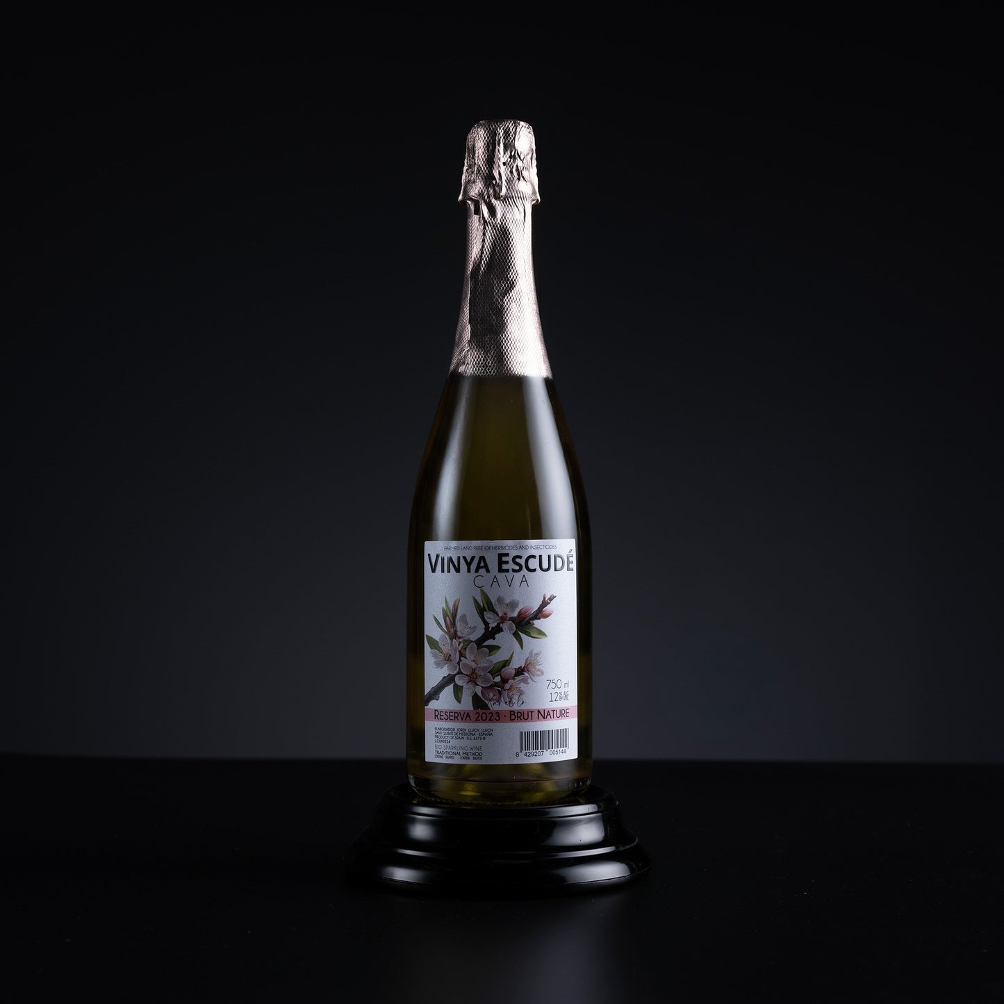 Bottle of Vinya Escude on a black background