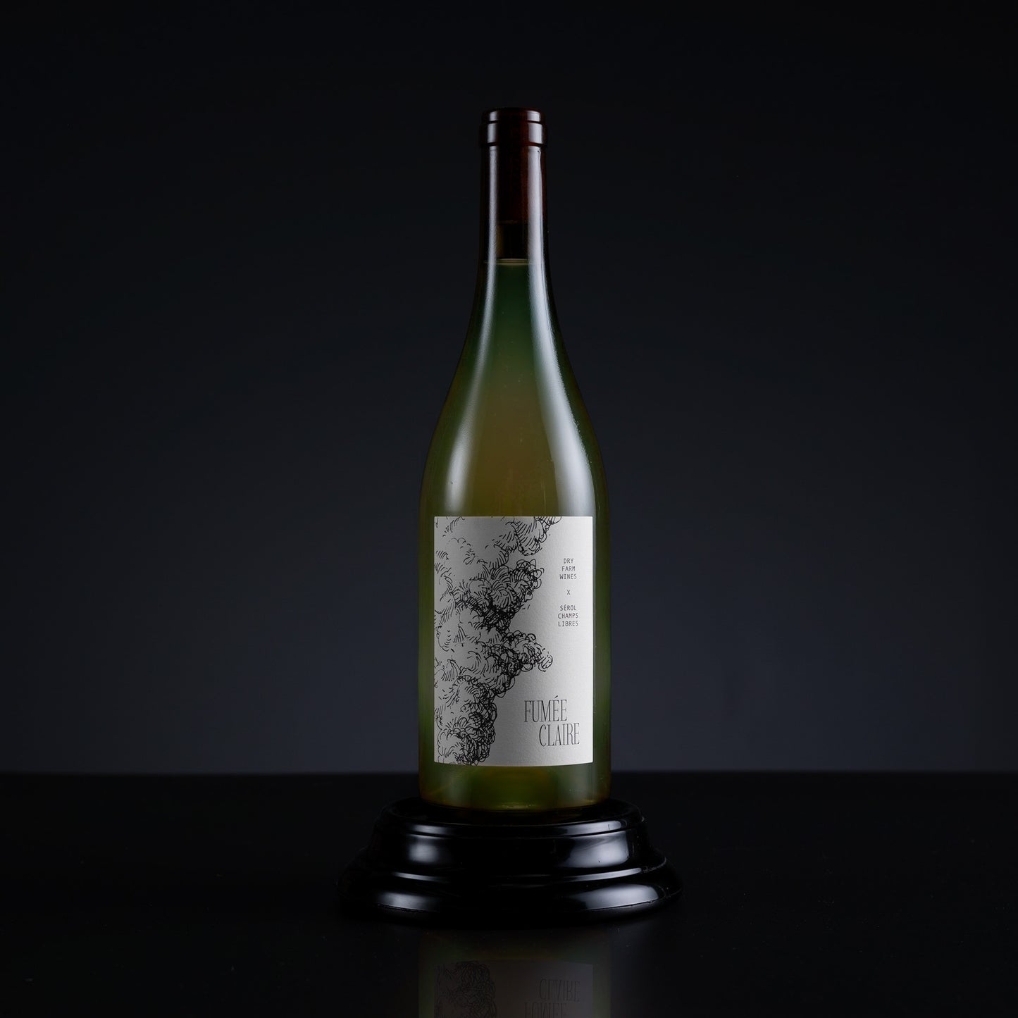 Wine bottle with a label on a dark background