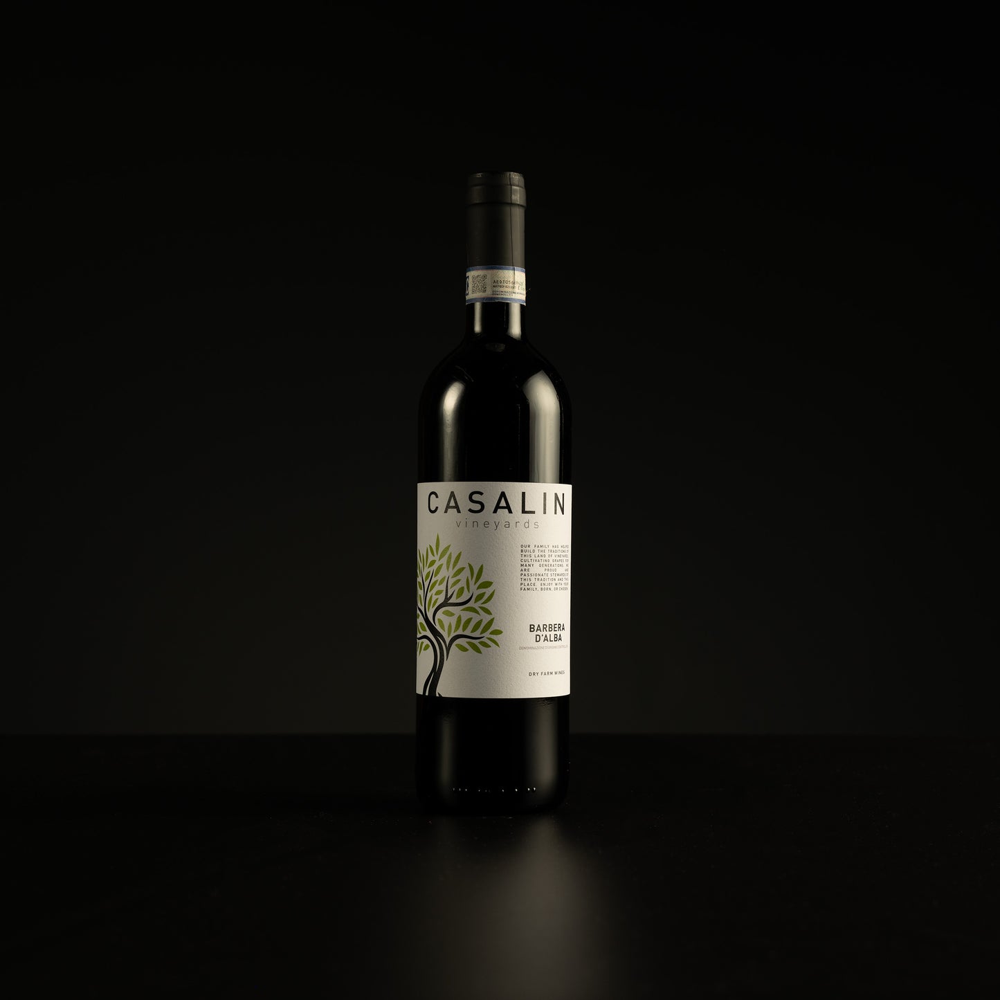 Wine bottle with 'Casalin' label on a black background