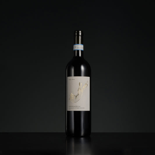 Wine bottle with a label on a black background