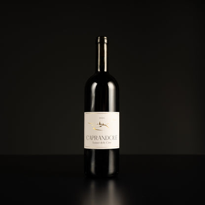 Wine bottle with a label on a black background