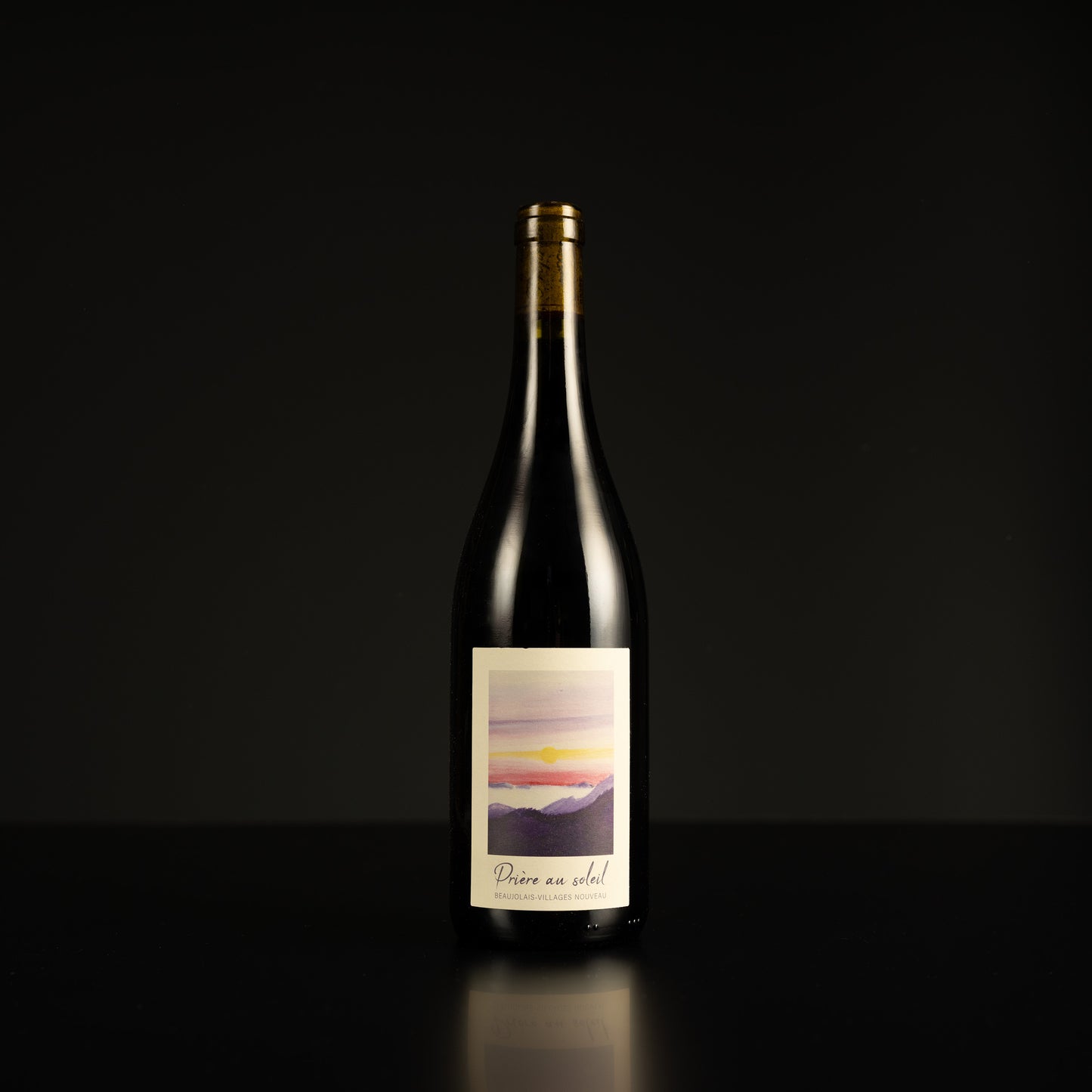 Wine bottle with a label on a black background