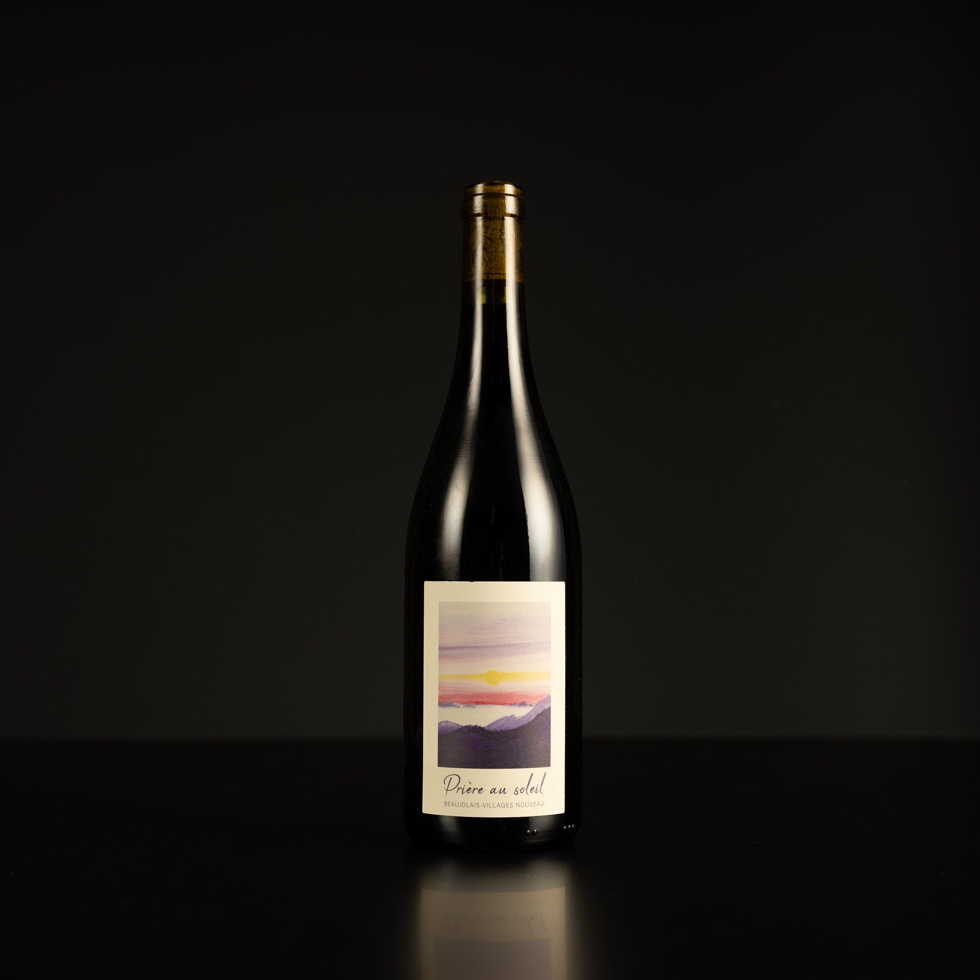 Wine bottle with a label on a black background