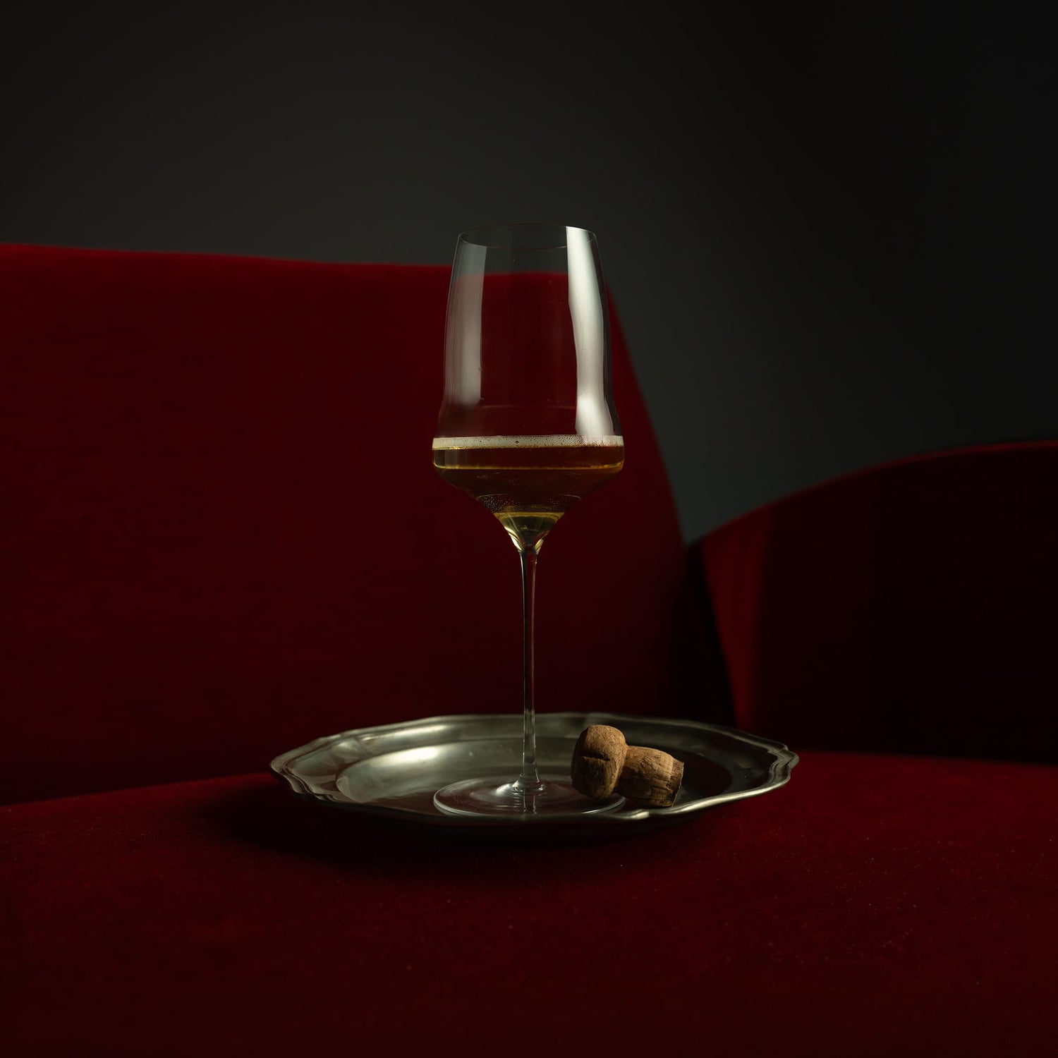 Wine glass with a dark background