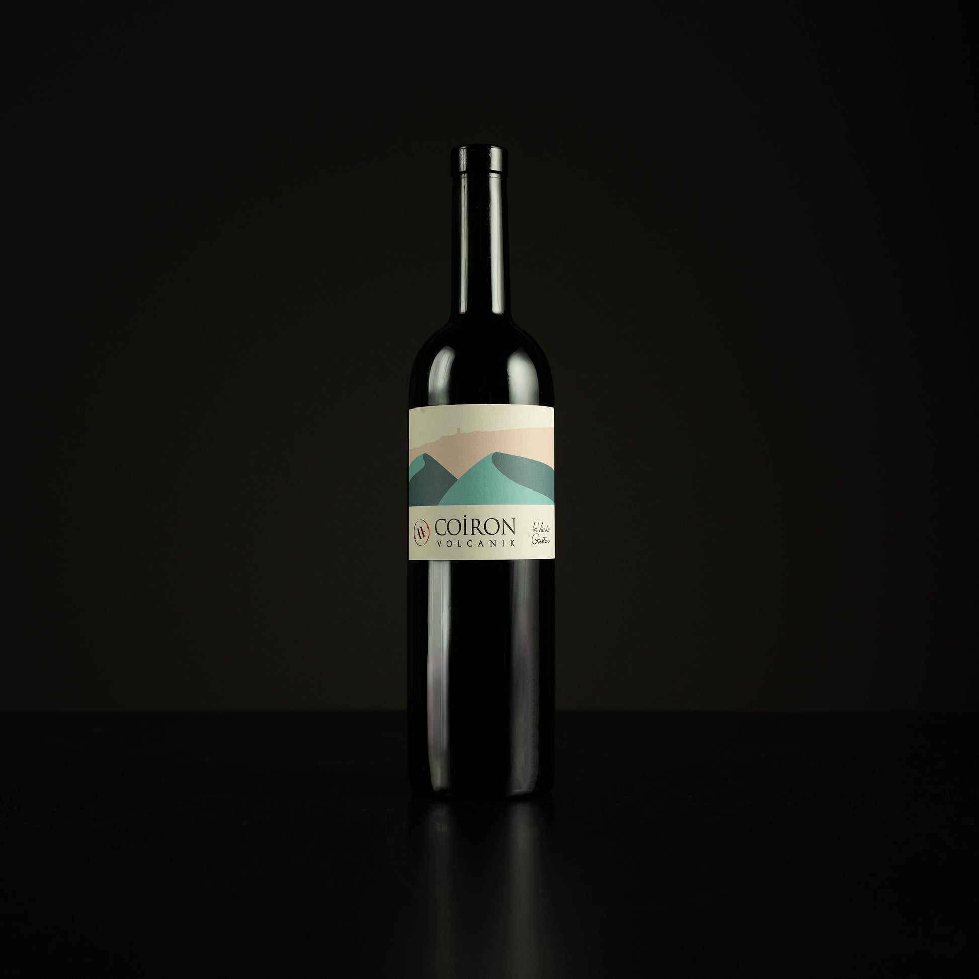 Wine bottle with a label on a black background