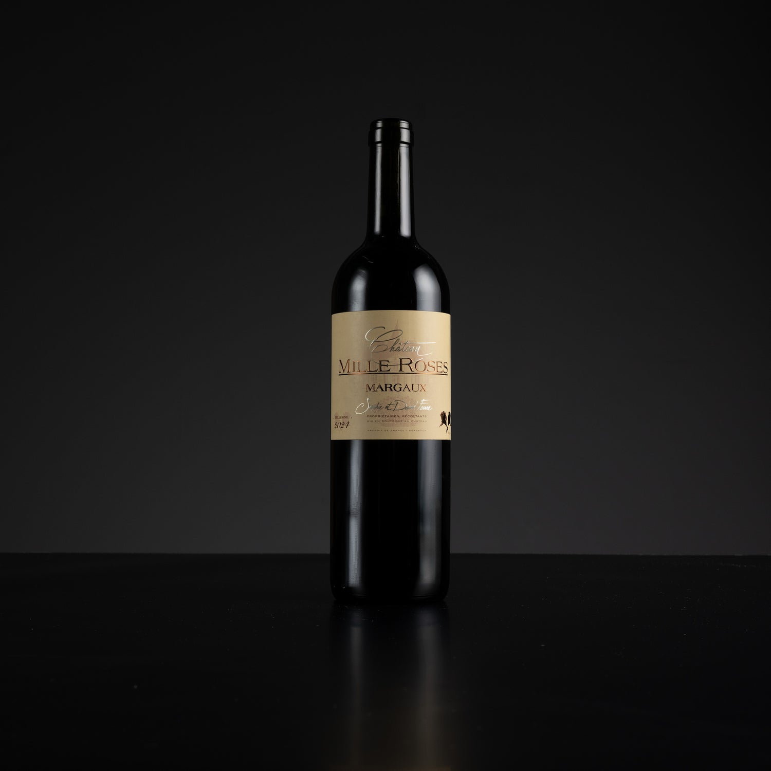 Wine bottle with a visible label on a black background