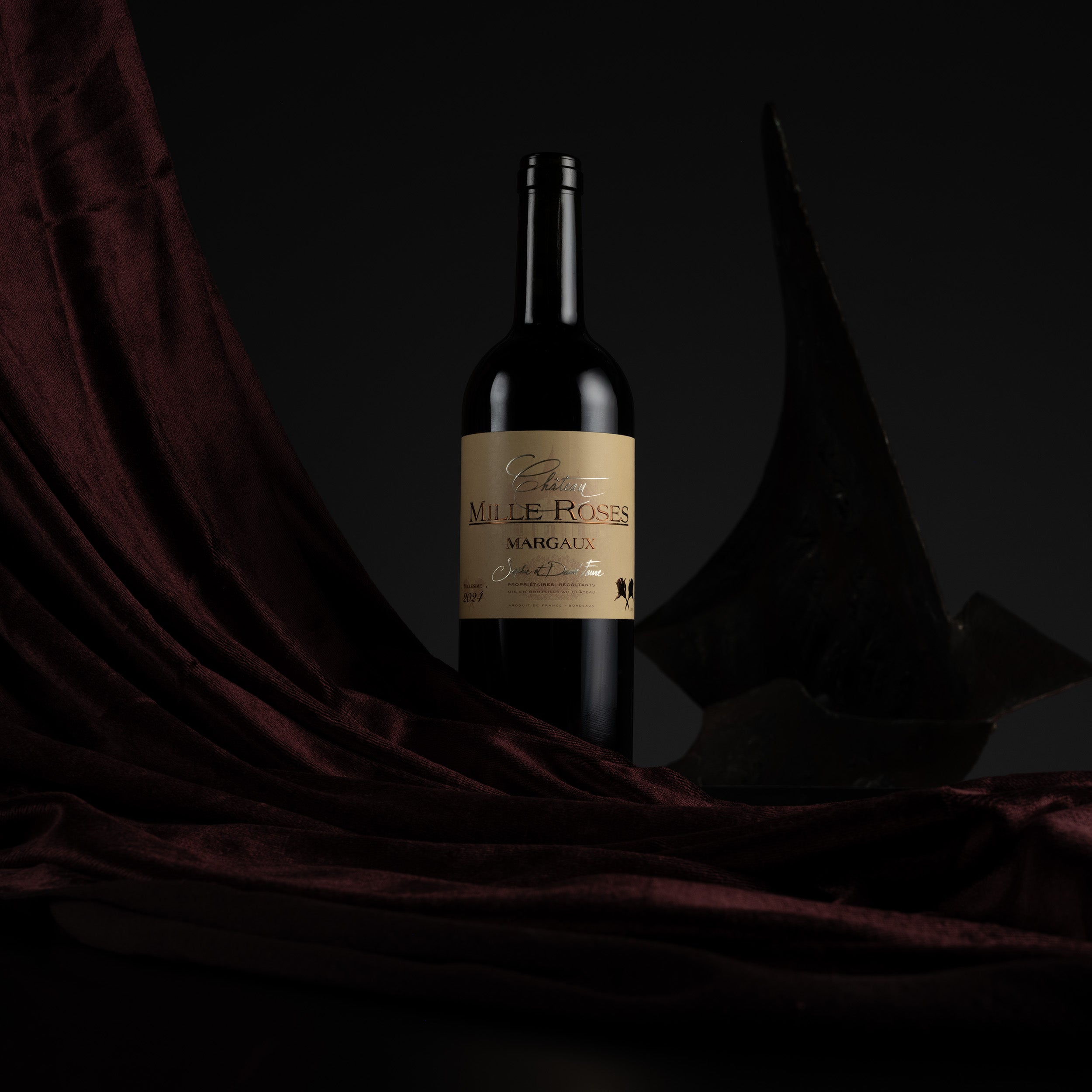 Wine bottle with a label on a dark background
