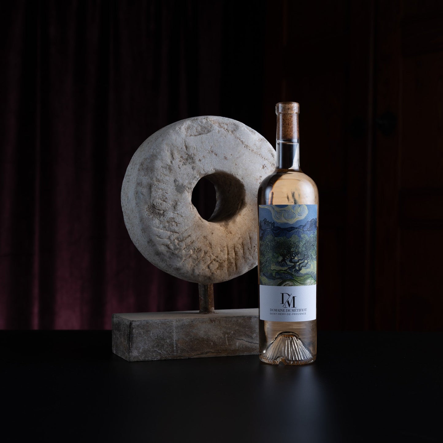 Wine bottle with a label on a dark background
