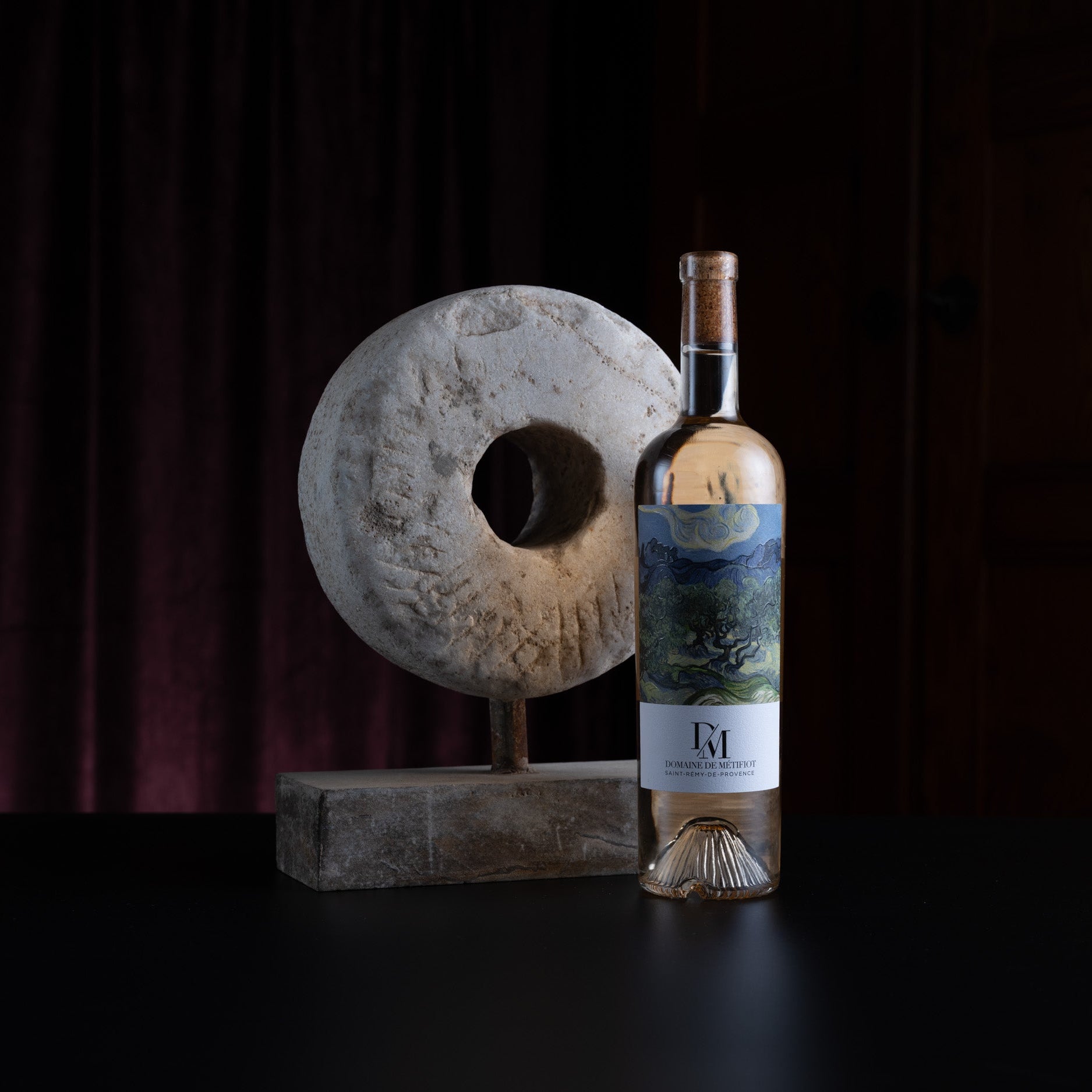 Wine bottle with a label on a dark background
