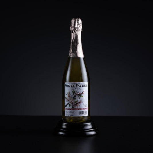 Bottle of Vinya Escude on a black background
