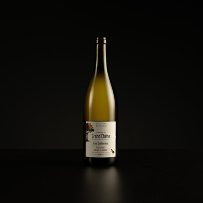 Wine bottle with a label on a black background