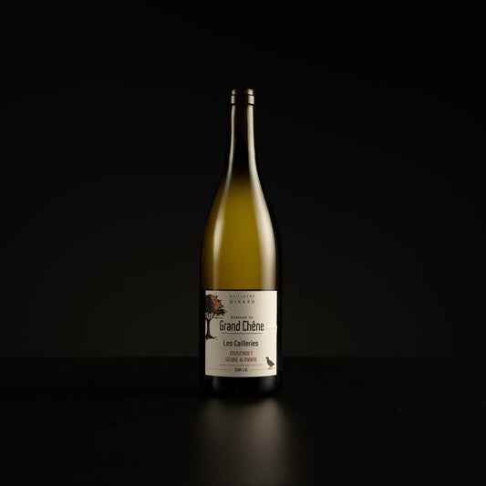 Wine bottle with a label on a black background
