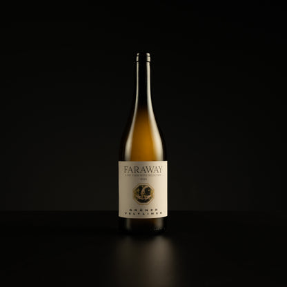 Wine bottle with 'Faraway' label on a black background