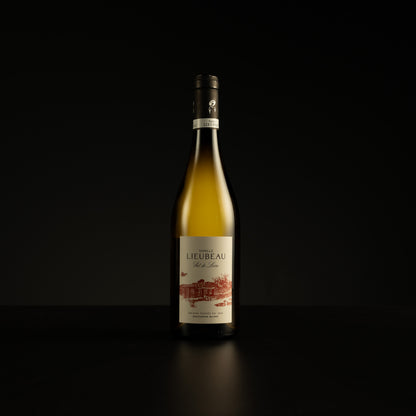 Wine bottle with Lieubeau label on a black background
