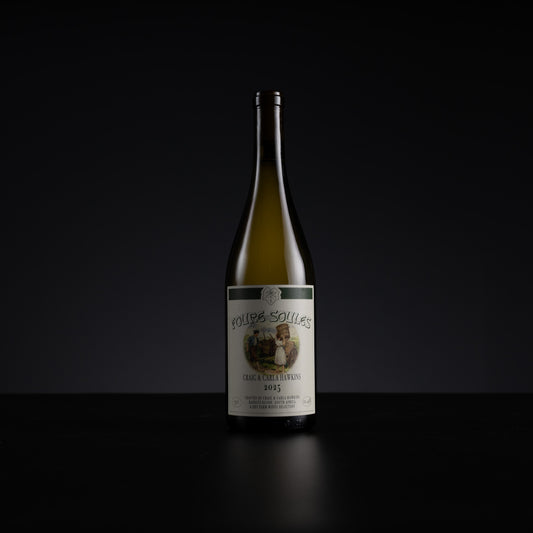 A single bottle of white wine standing upright on a dark surface against a black background. The bottle is pale green glass with a cream-colored label featuring an illustration and the text 'Rouges-Souls' and 'Cru White'.