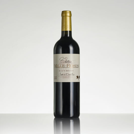 Wine bottle labeled 'Chateau Mille-Roses' on a white background