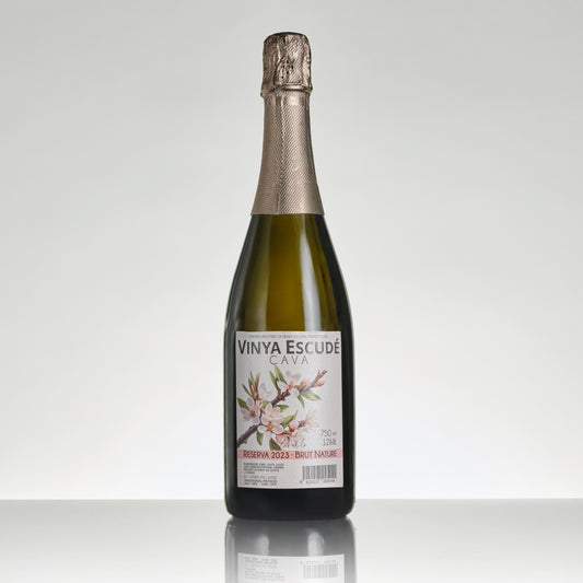 Bottle of Vinya Escude Cava on a white background