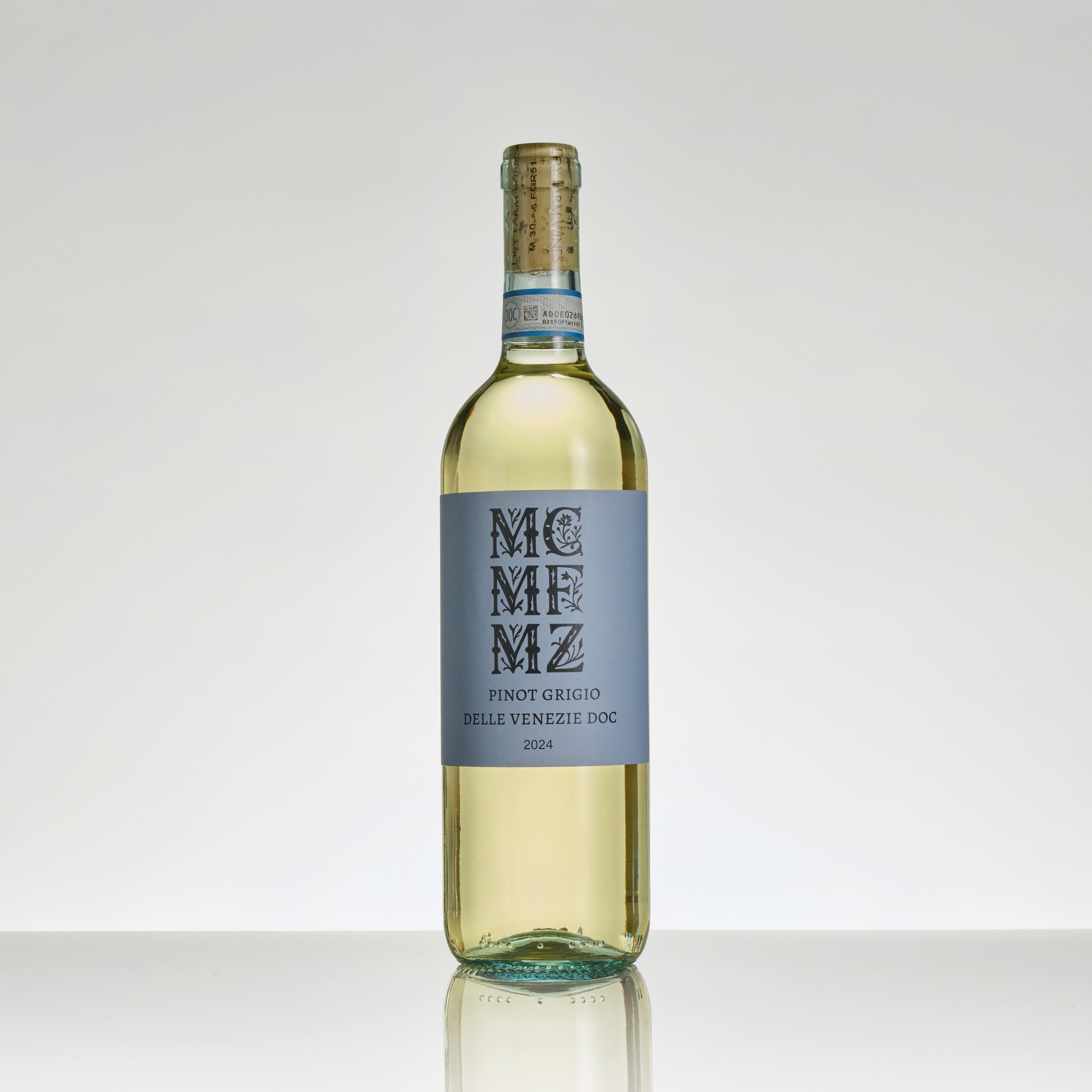 Wine bottle with a blue label on a white background
