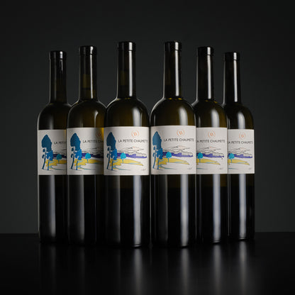 Six bottles of La Petite Chaumette wine arranged in two rows on a dark background