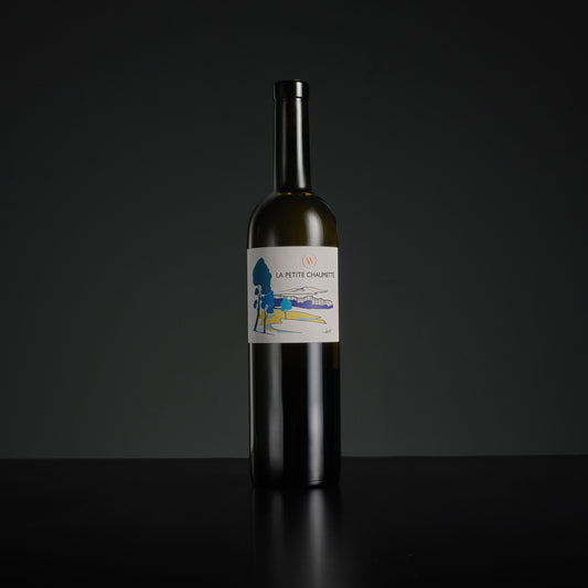 Wine bottle with a label on a black background